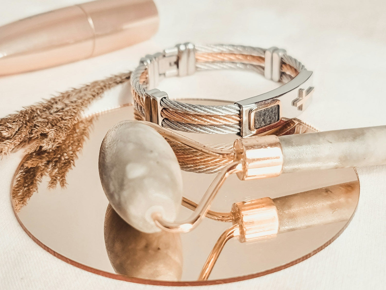 Natural-rose-quartz-facial-roller-to-reduce-puffiness-and-improve-skin-glow